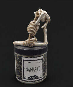 Arms behind back namaste candle
