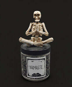 Meditating namaste candle